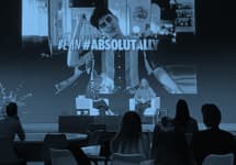 IIEX topical event stage with speaker presenting to an audience