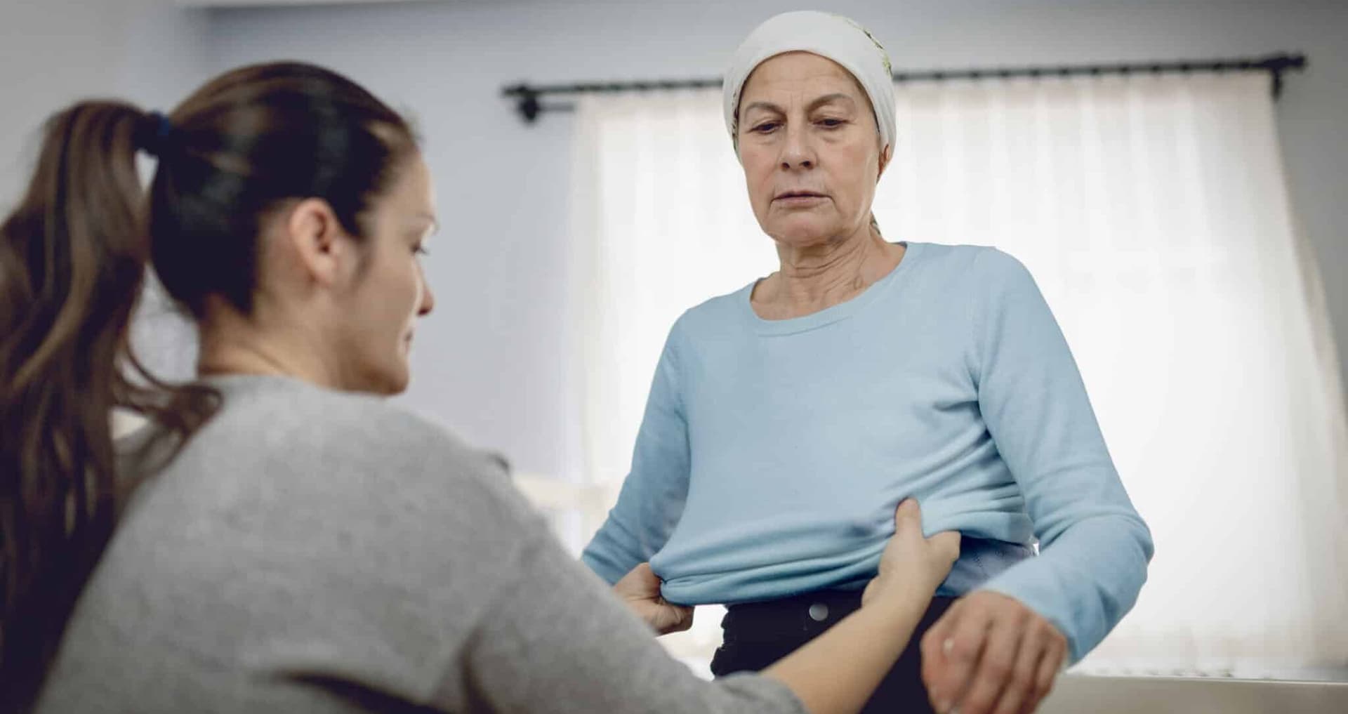 woman who dresses her sick and tired mother