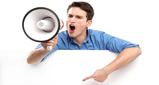 Man with megaphone and white board