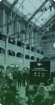 IIEX exhibition floor with booths and attendees